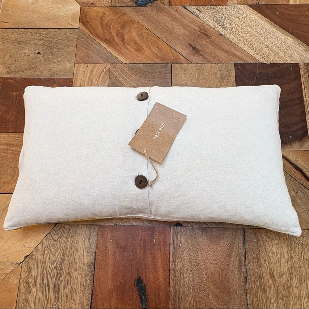 Two West Elm Gold and Gray Patterned Accent Pillows